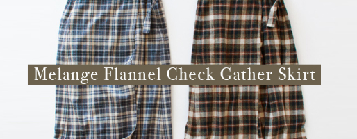 気負わず着られるクラシック。ふんわり軽やかに揺れる、ラップ風チェックスカート。