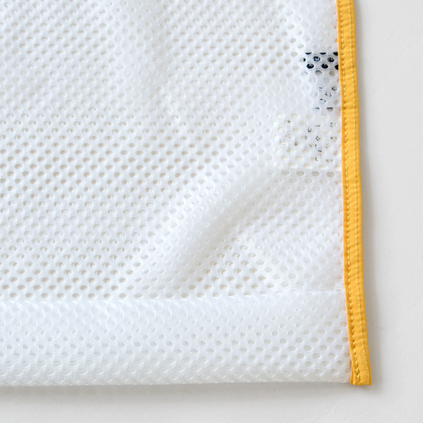 約4cmの折りあげがあり、使用時にマチとなります。 約4cmの折りあげがあり、使用時にマチとなります。