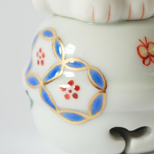 「別注七宝の花 左手」の鈴には、青い七宝の花 「別注七宝の花 左手」の鈴には、青い七宝の花