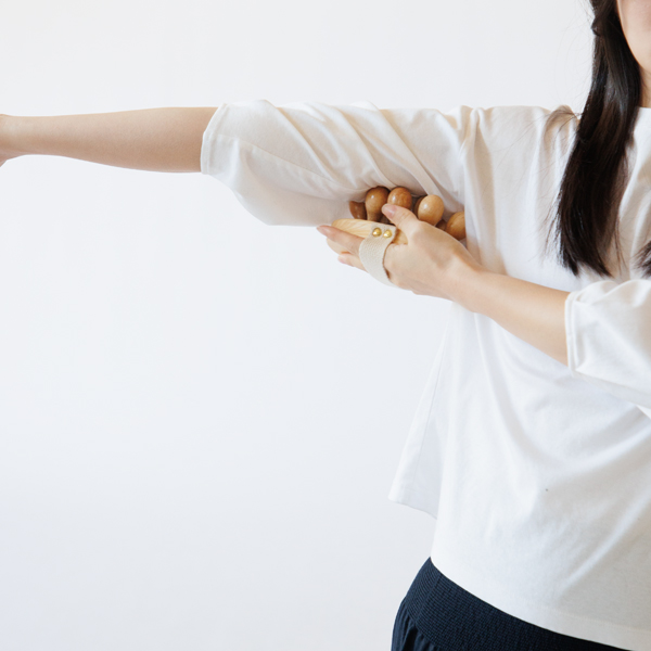 外側へ押し出すようにコロコロ