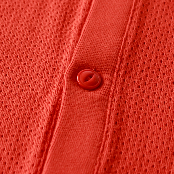 鮮やかなカラー。ボタンも同色です。（ORANGE）